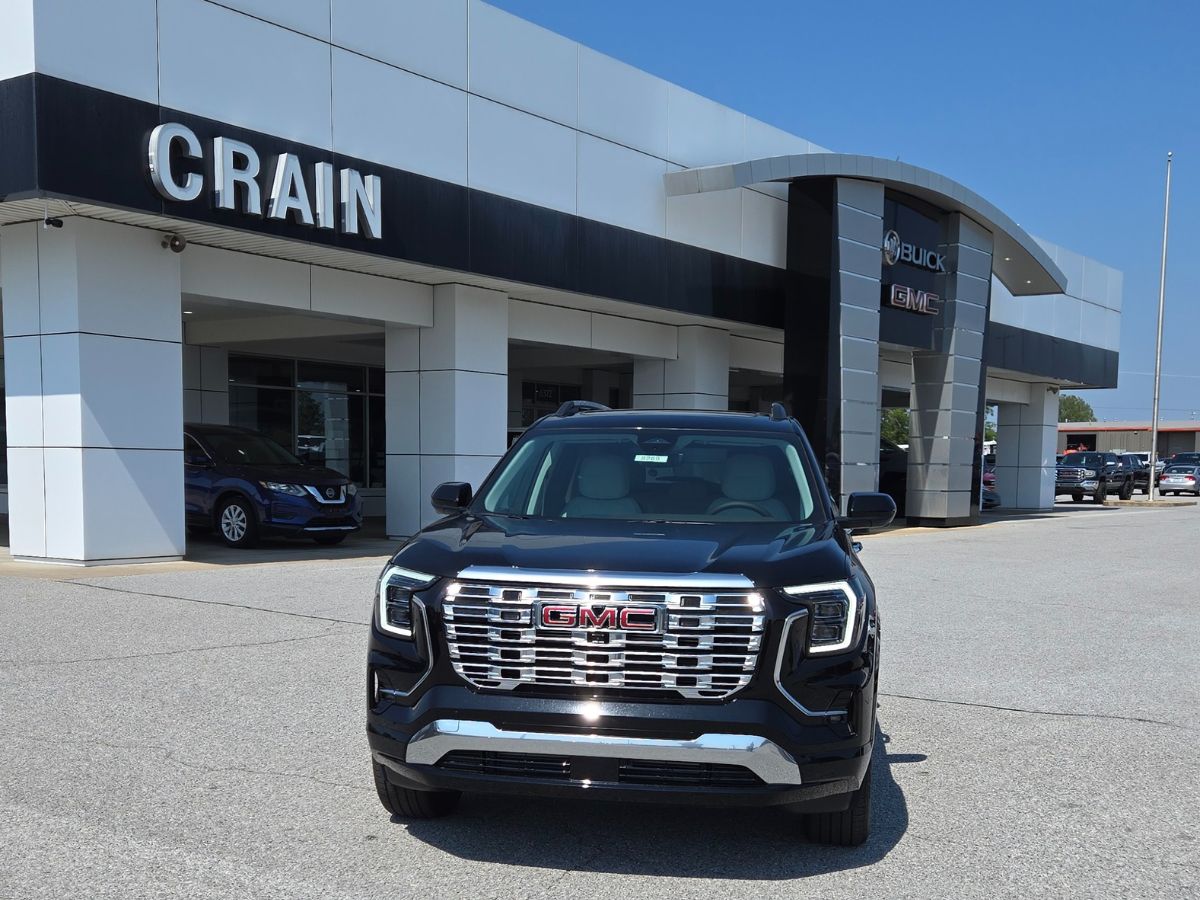 New GMC SUV parked outside Crain Buick GMC dealership in Springdale, Arkansas